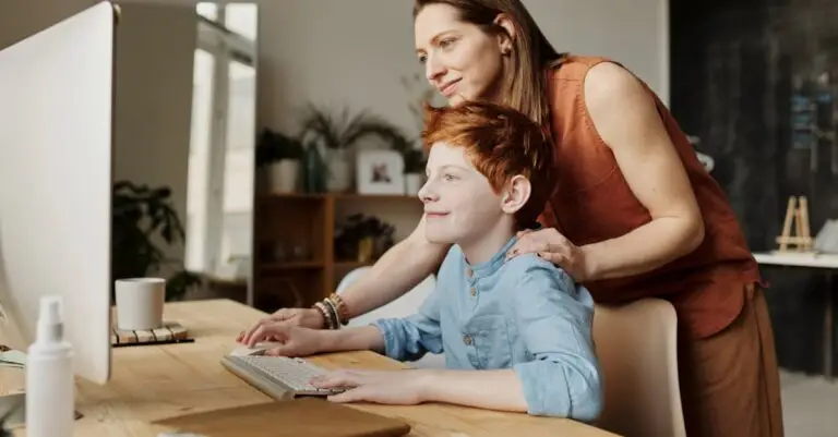 A parent and child learning French together