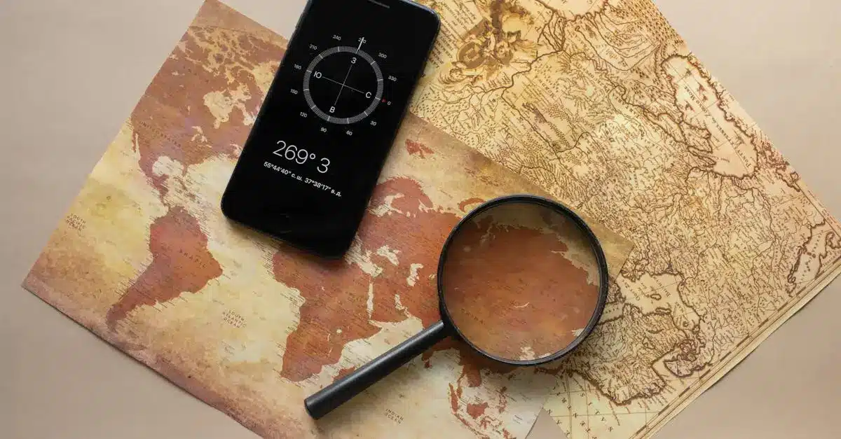 Top view of magnifying glass and cellphone with compass with coordinates placed on paper maps on beige background in light room